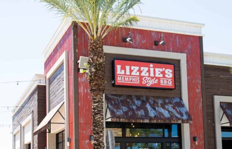 Lizzie’s Memphis Style BBQ front entrance at Sunset Walk in Kissimmee, Florida