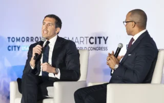 Falcone Group COO Alfonso Costa Jr. and U.S. Secretary of Housing and Urban Development Scott Turner speak at the 2026 Tomorrow City USA Conference.